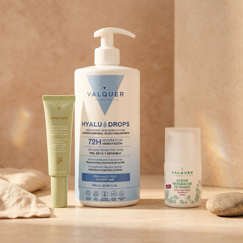 Hyaludrops Sin Perfume, crema facial Energy Bomb y sérum reparador de manos de Valquer en un bodegón luminoso.