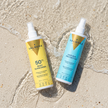 Pack Protector Solar Corporal SPF 50 y Protector Solar Capilar de Valquer sobre arena mojada en la playa