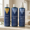 Champú cabello graso, champú extra volumen y acondicionador bifásico Valquer sobre encimera de baño