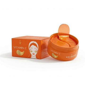 Parches de hidrogel para ojos con vitamina C de Valquer junto a su envase